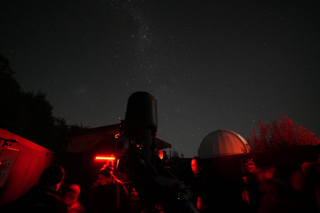 16" Telescope under night sky.